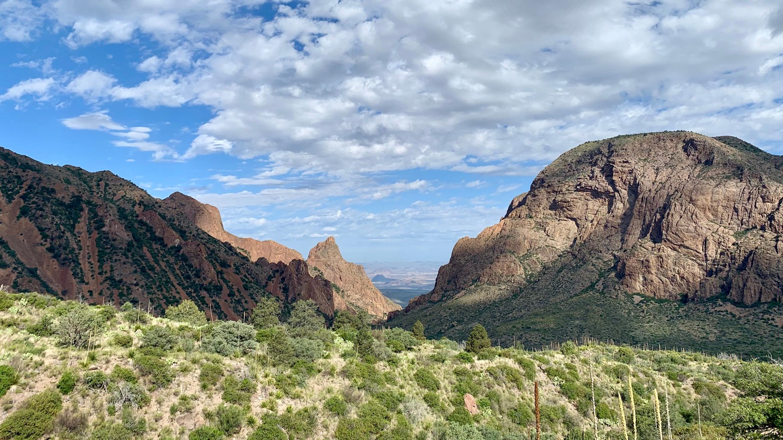 Several mountain peaks frame a