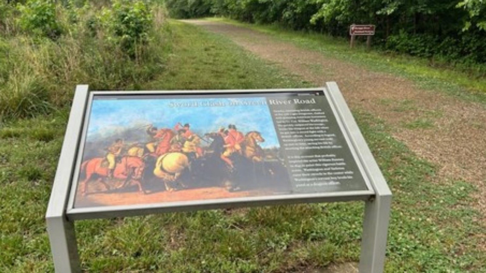 A painting of soldiers fighting. Some are on horseback. 
