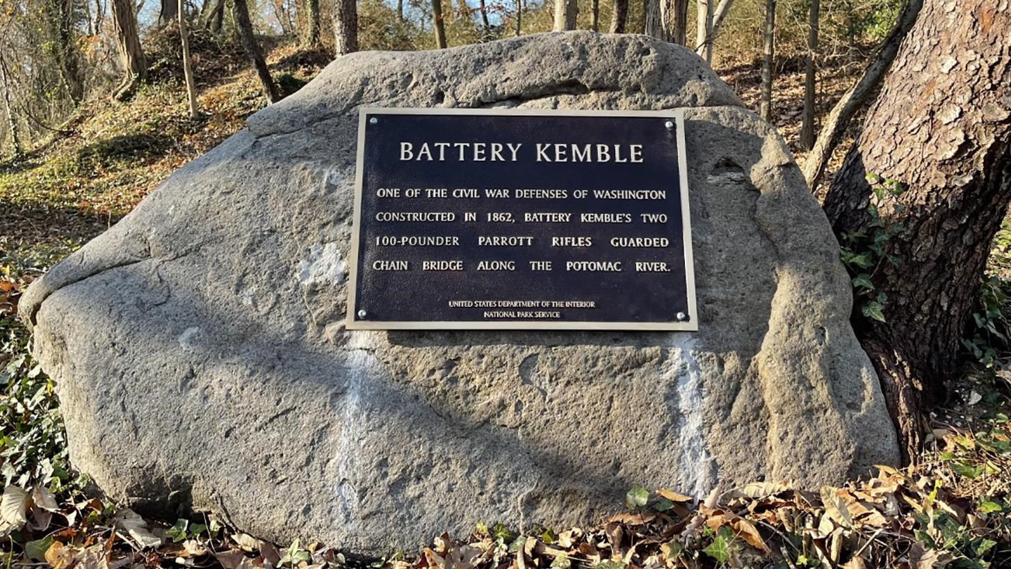 Bronze Plaque at Battery Kemble Park mounted on stone boulder.