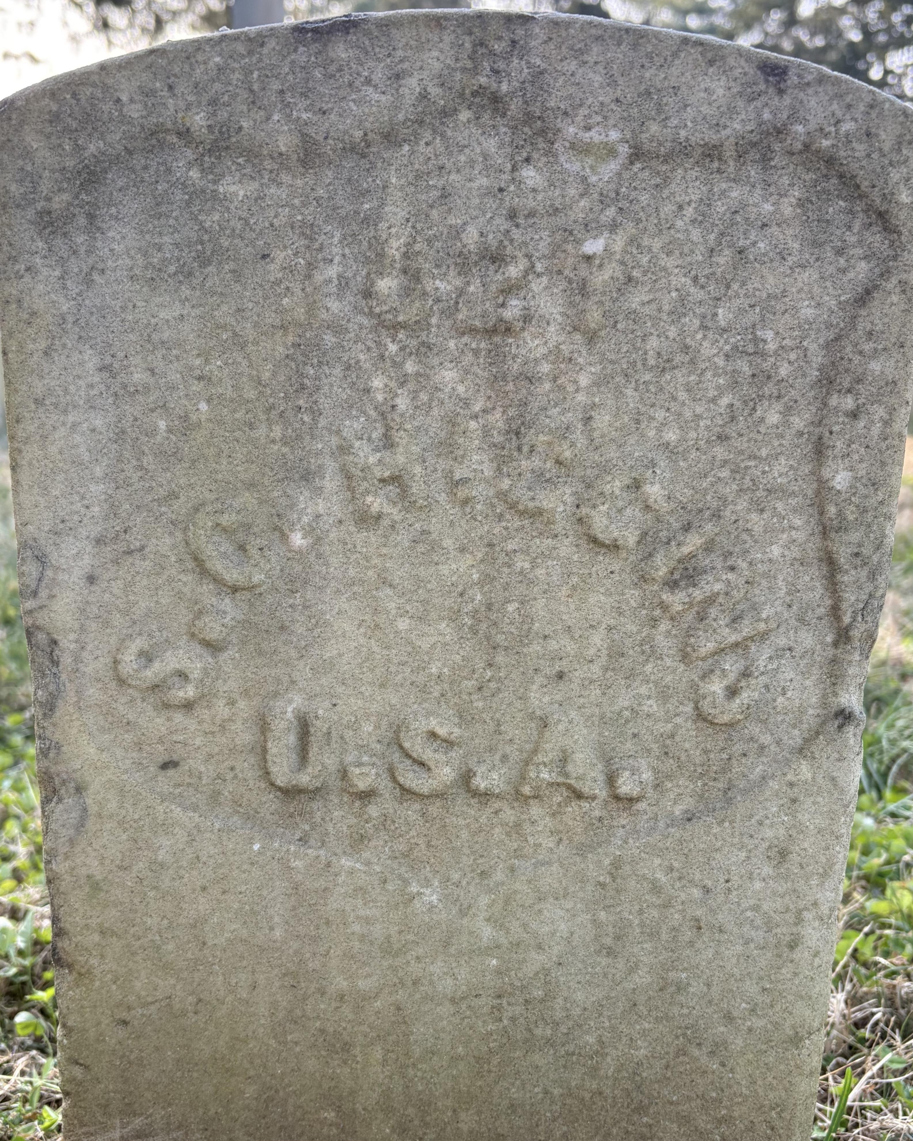 The headstone of Samuel C Higgins who is buried in Stones River National Cemetery.