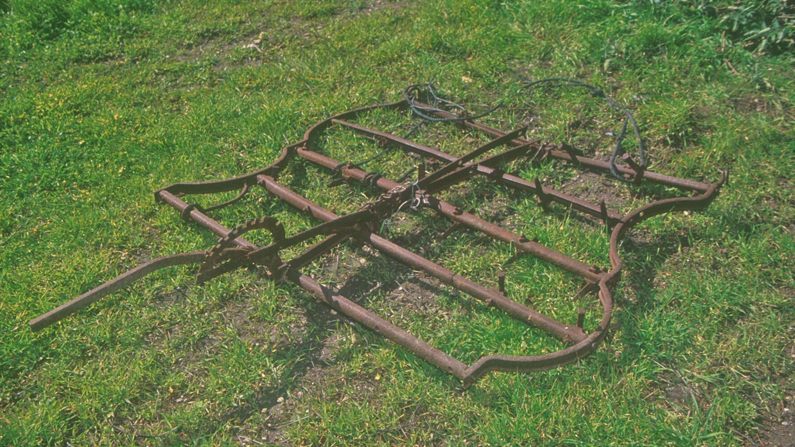 Early horse-drawn disk harrows were first featured in the 1890s. One type of harrow used here was