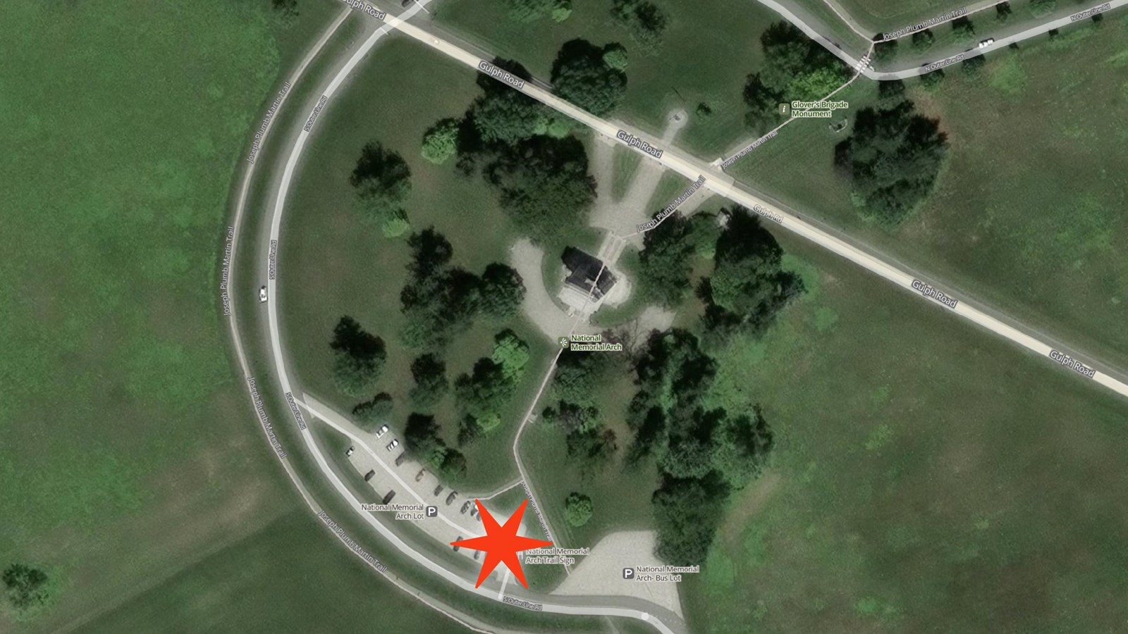 Aerial photo of National Memorial Arch area with red star in parking lot.