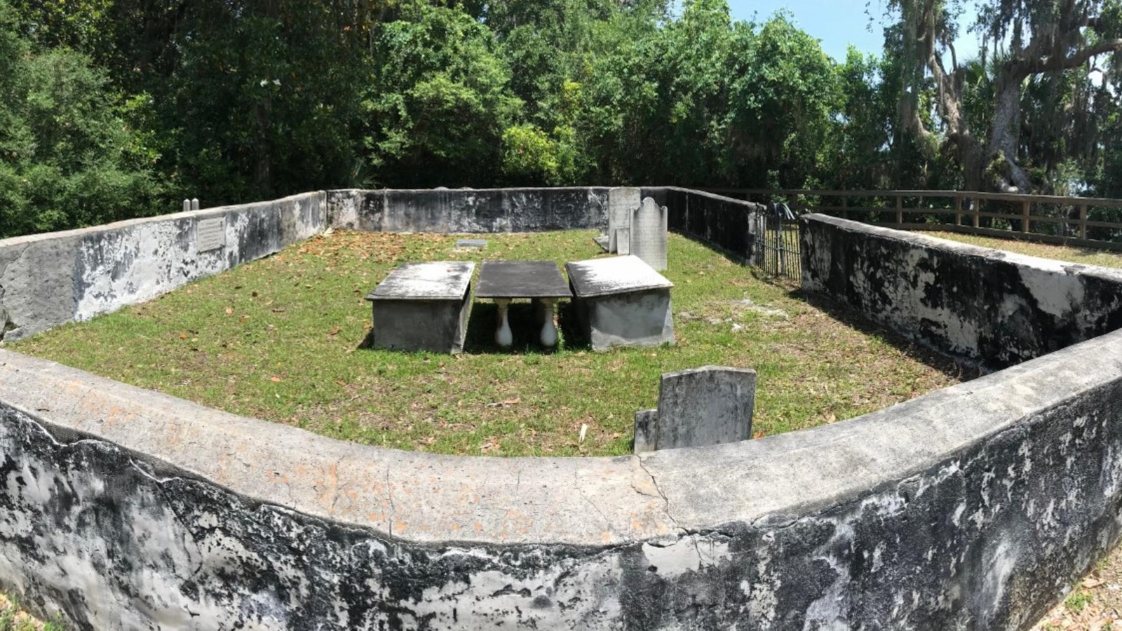 Four-sided Greene-Miller cemetery with headstones spanning eras of Cumberland Island\'s history