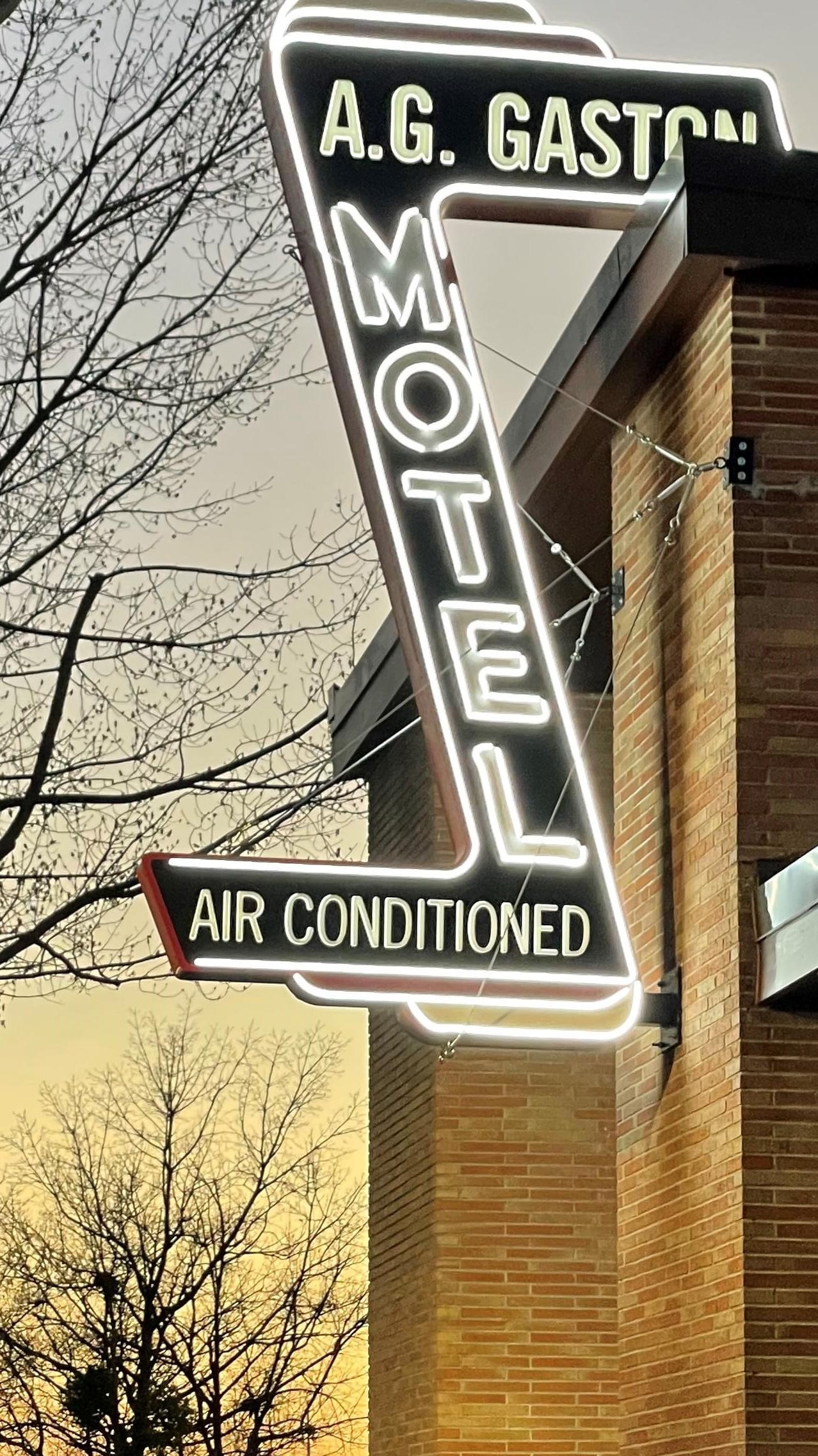 Gaston Motel sign lights up the evening sky in downtown Birmingham, AL