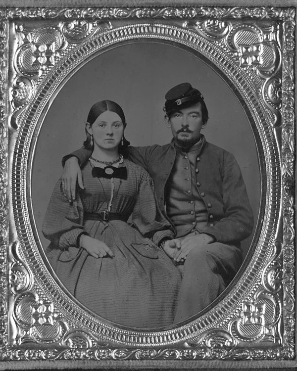 Man in Confederate uniform with sister