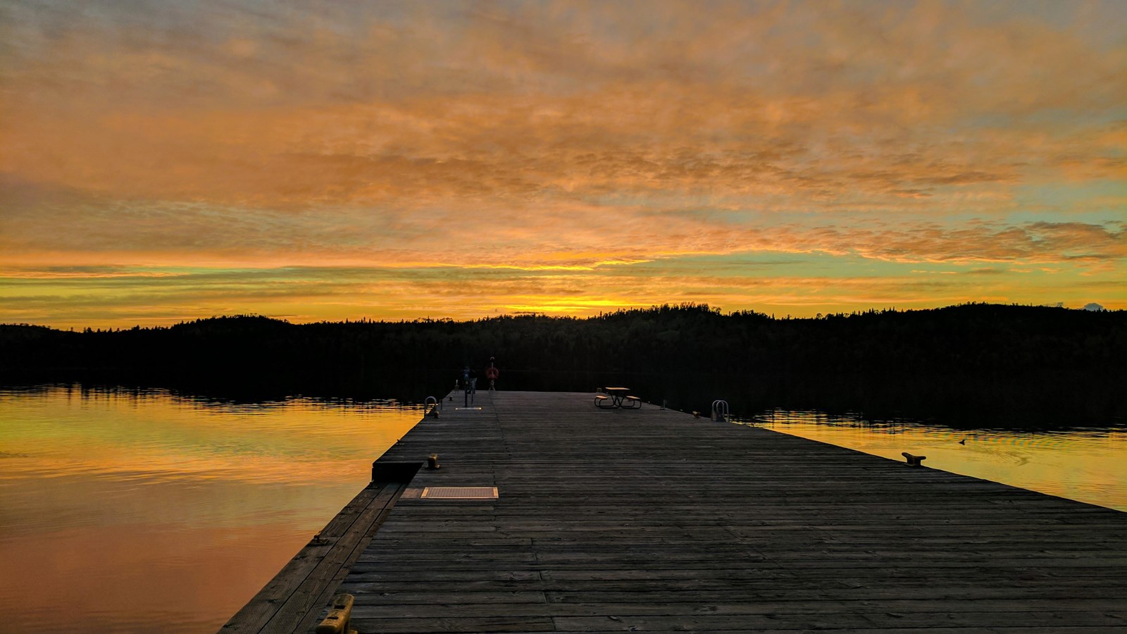 The sun sets over Washington Harbor and the Windigo Dock.
