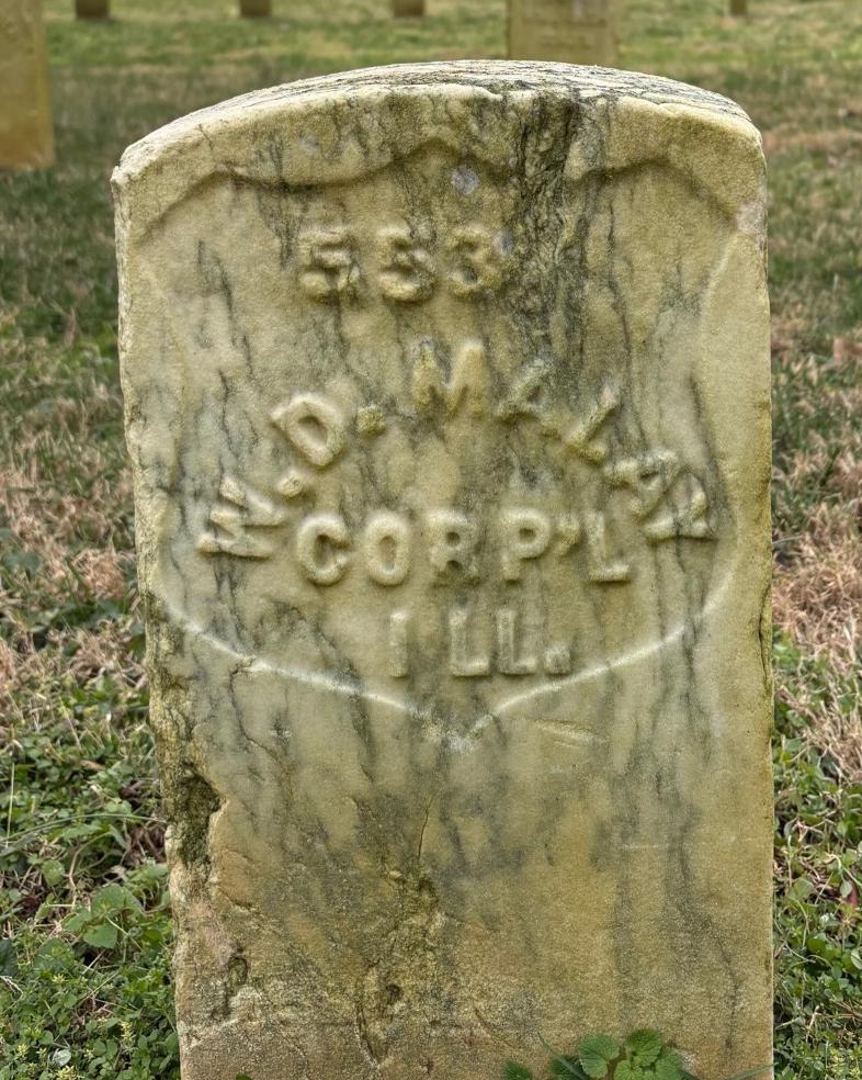 Marble headstone belonging to William Malay.