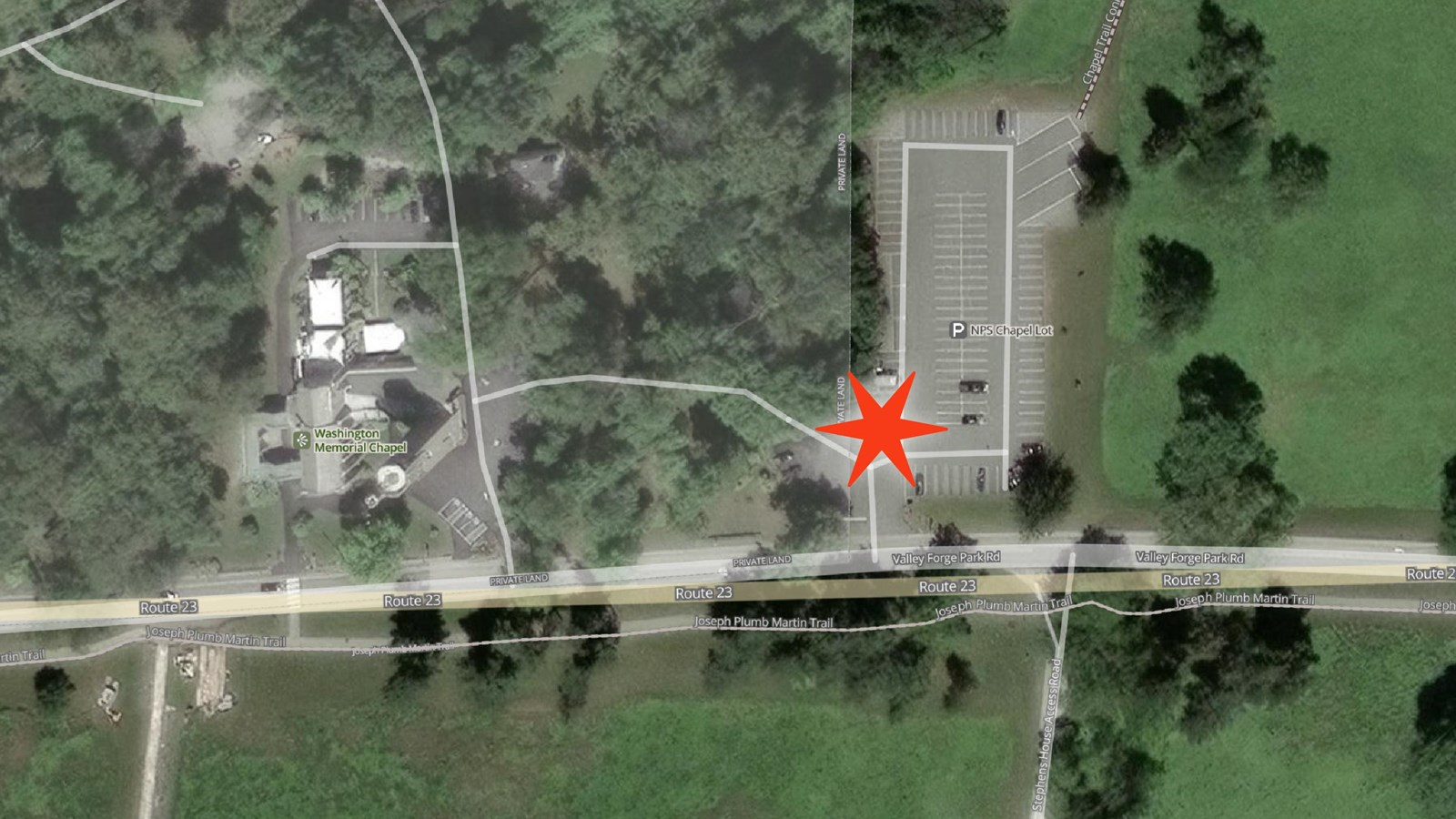 Aerial photo of Washington Memorial Chapel area with star in NPS parking lot