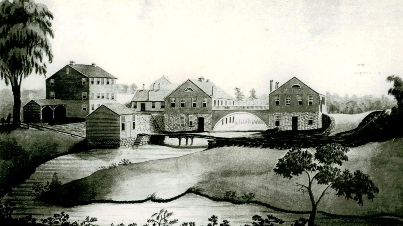 A black and white photo of a painting of Upper Water Shops. Buildings spanning a river with trees. 