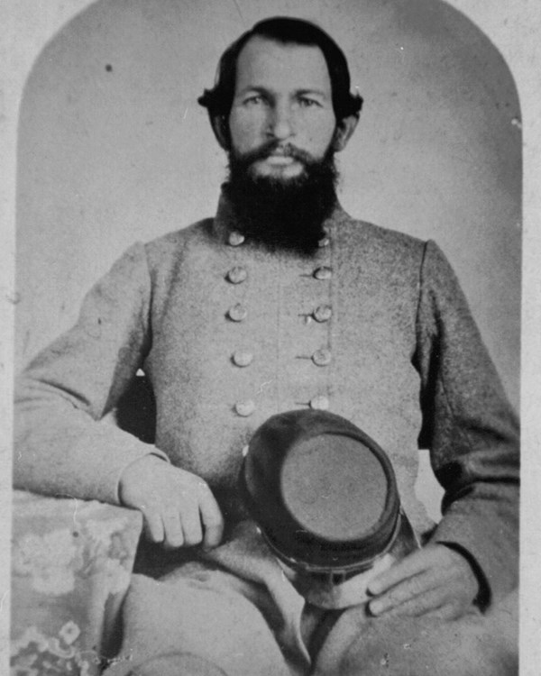 Man in Confederate Uniform sitting