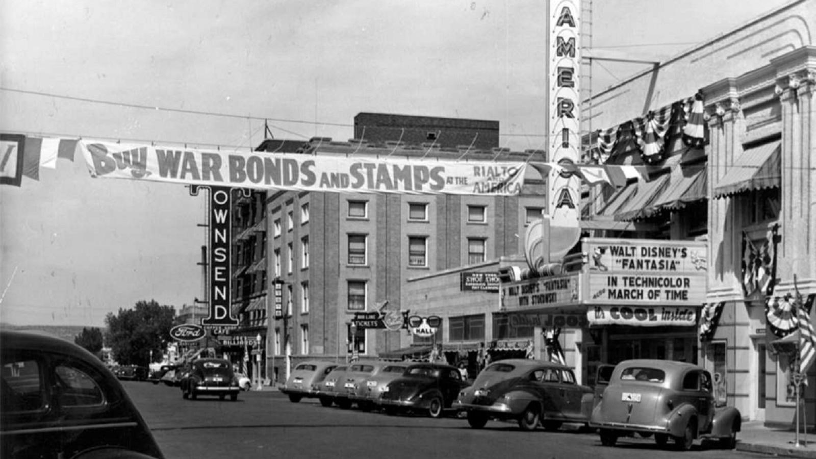 main street with banner reading Buy War Bands and Stamps