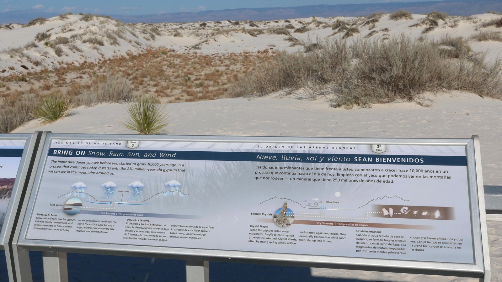 Sign that explains the different weather events that help shape the dunefield.