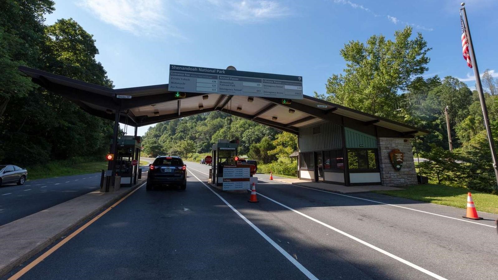 A color photograph of an entrance station for vehicles.