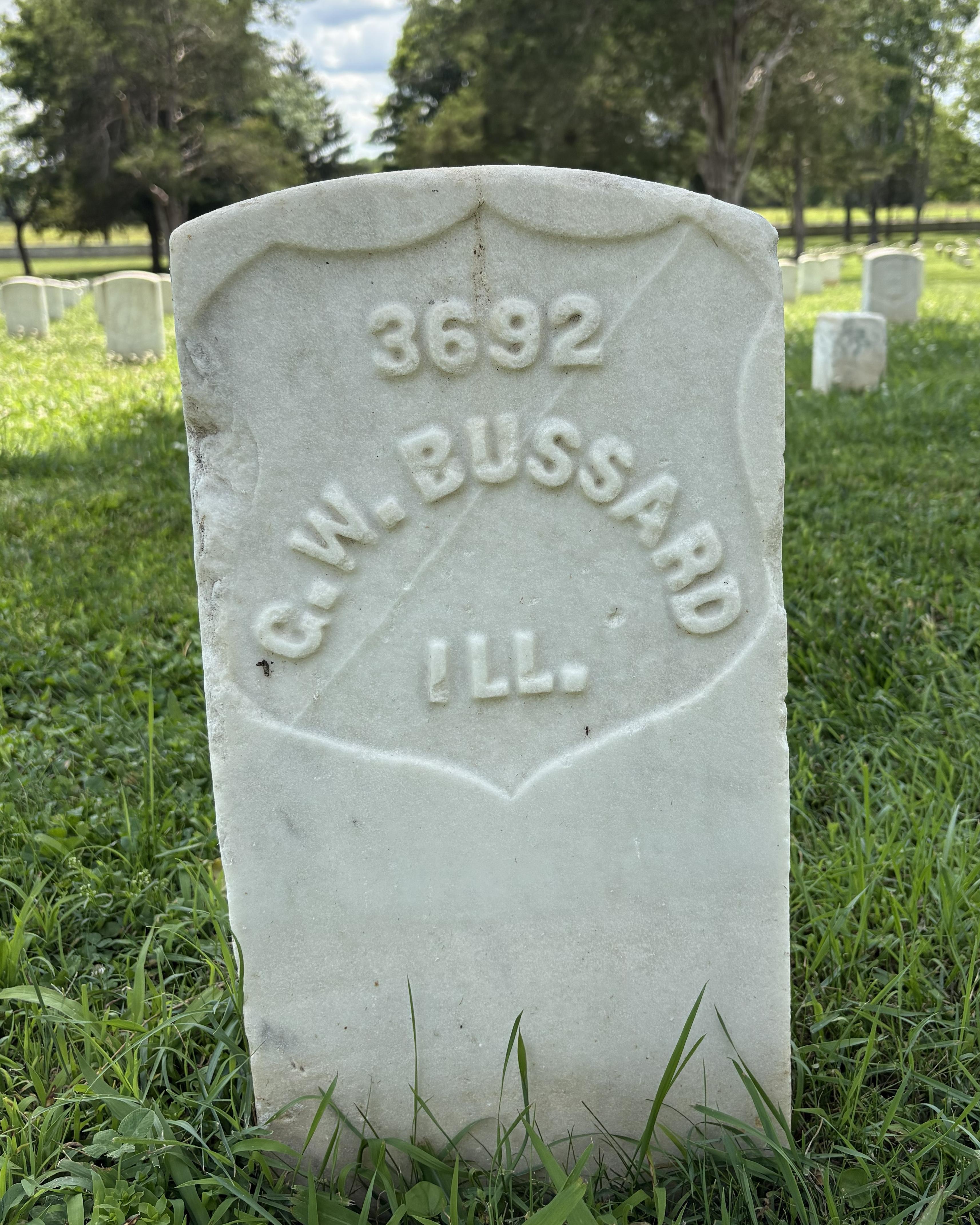 Marble headstone belonging to George Bussard. 
