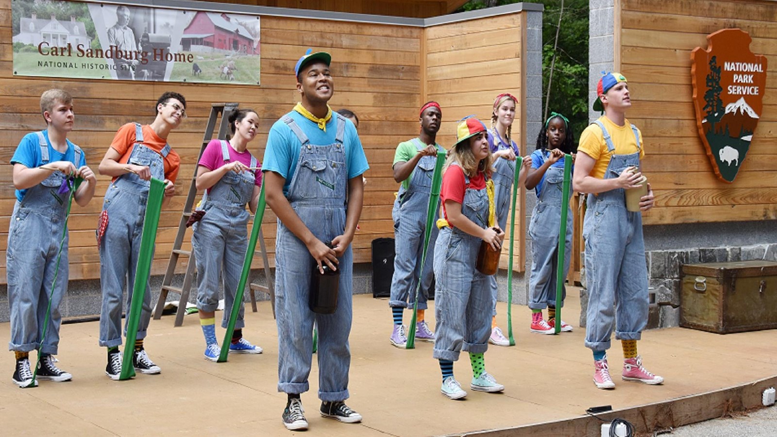 Actors and actresses performing at an outdoor theatre