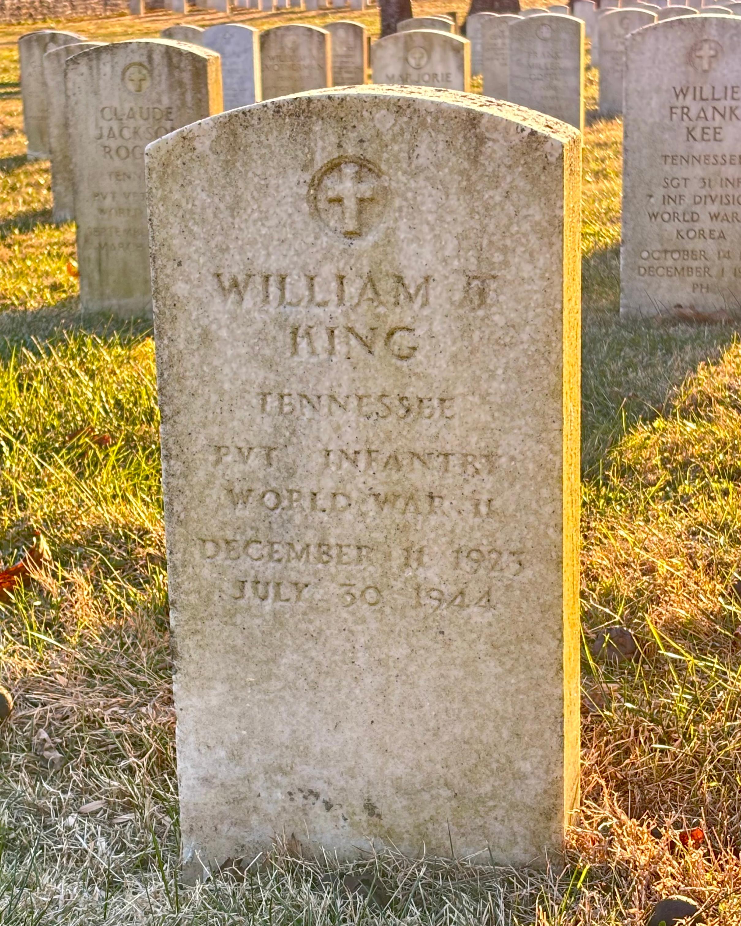 Headstone reading "William T King Tennessee PVT Infantry WWII Dec 11 1923 July 30 1944"