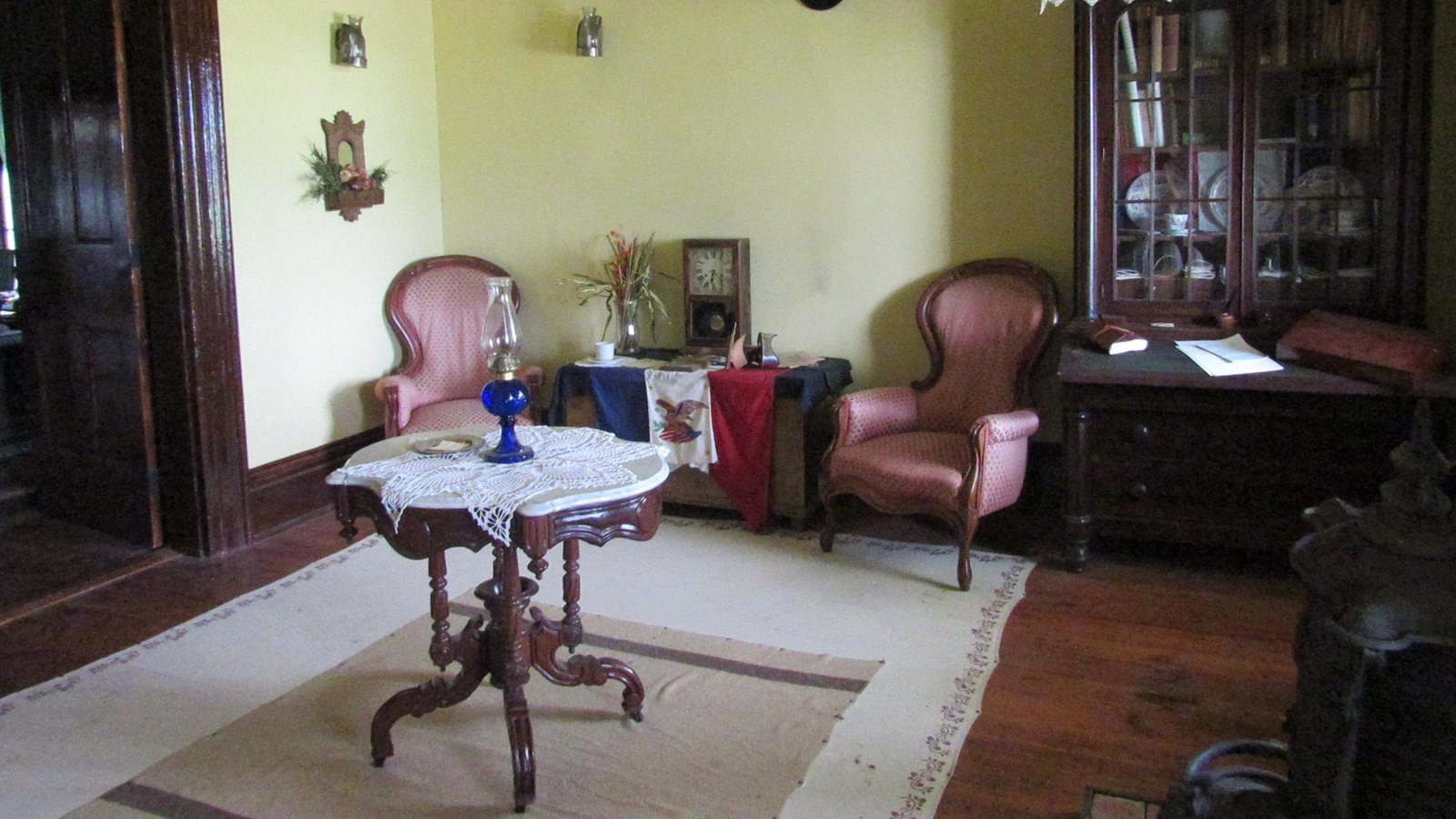 Parlor furnished with mid-19th century furniture.