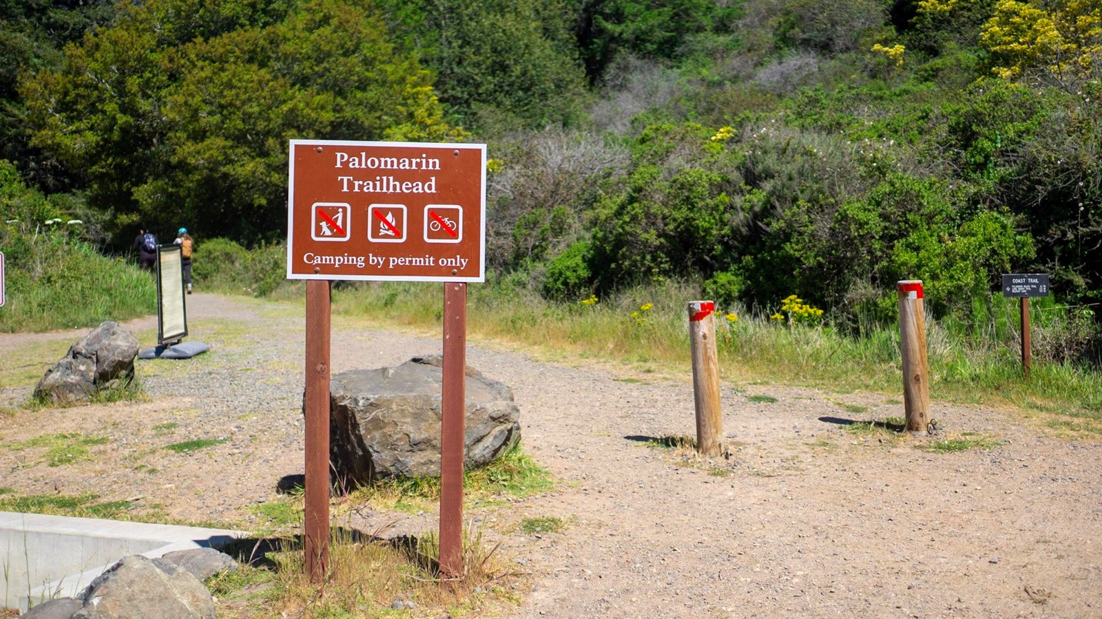 A trailhead sign reading 