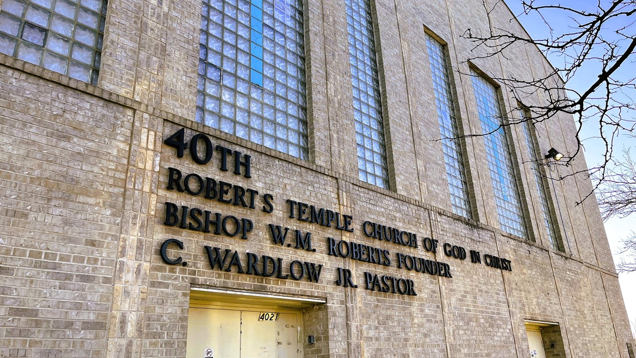 church exterior with large multi-paned windows