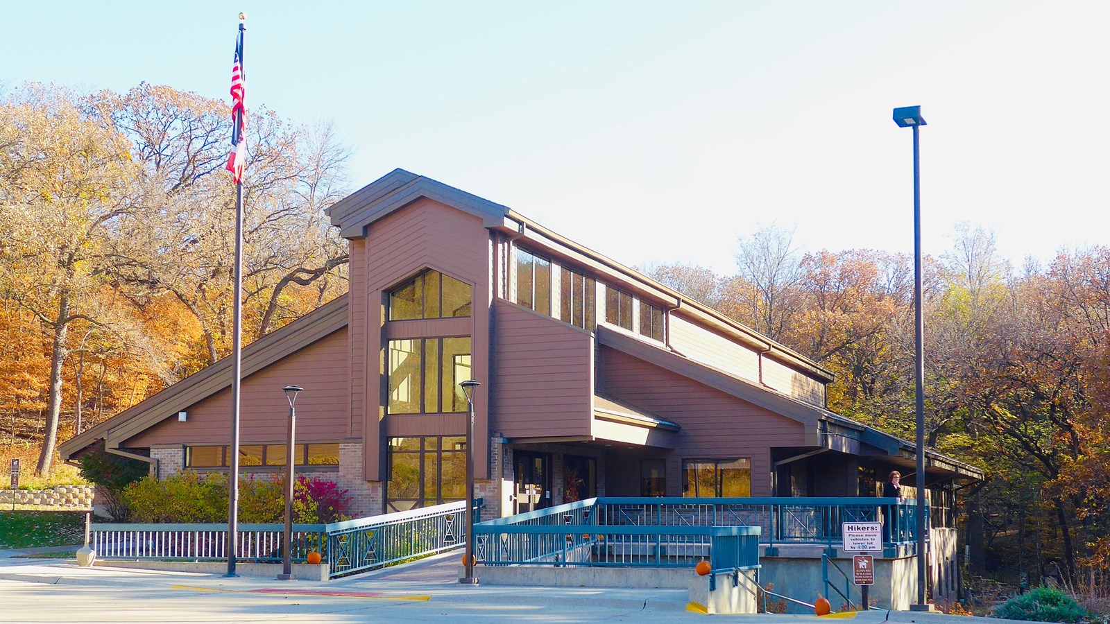 Brown-shingled building with large windows