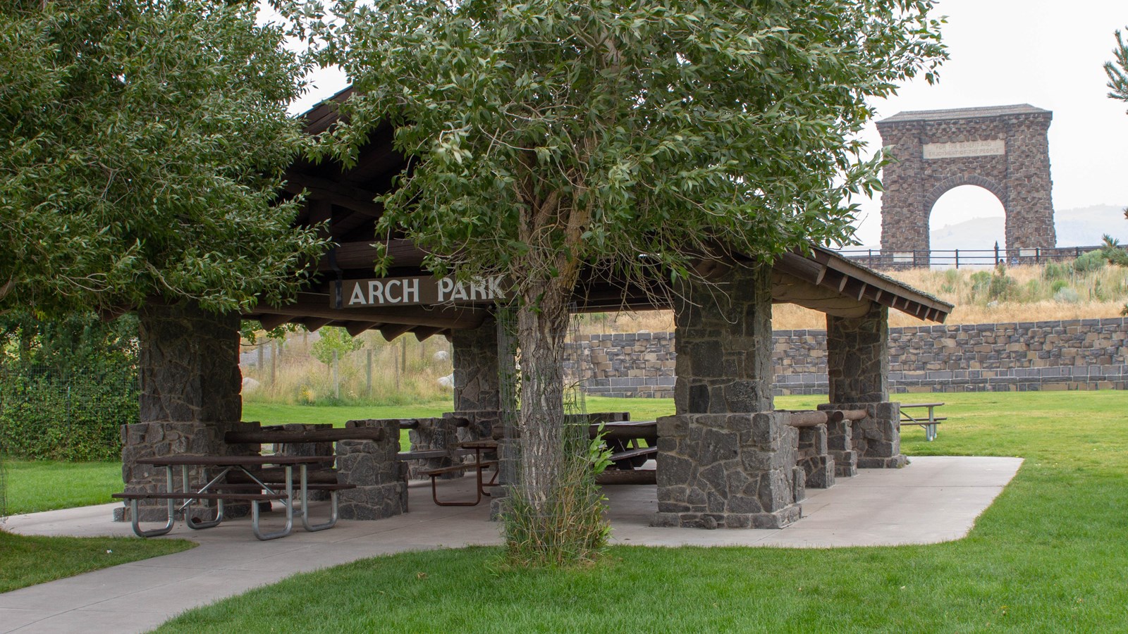 Picnic table shelter and Roosevelt Arch