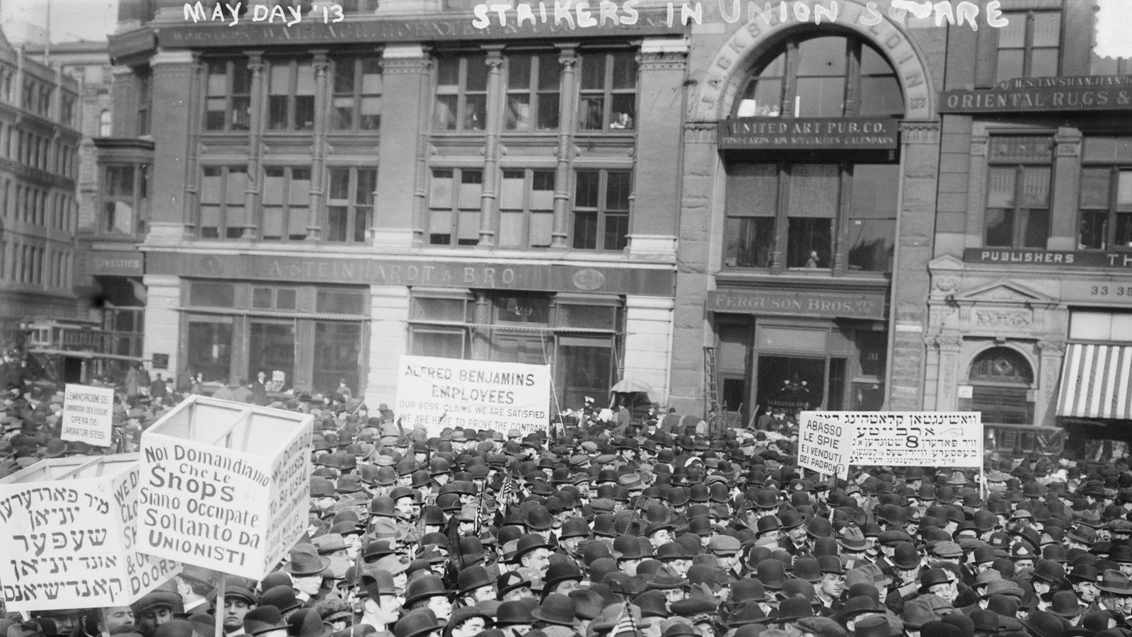 Historic black and white image of strikers in Union Square in Manhattan, New York City.