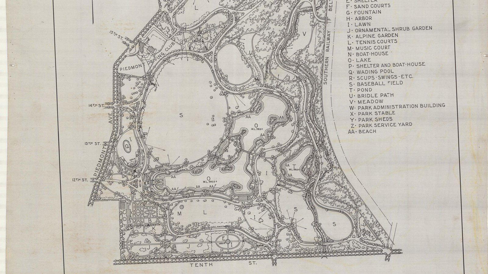 Plan of triangular park with some open areas, lots of curving paths lined with trees