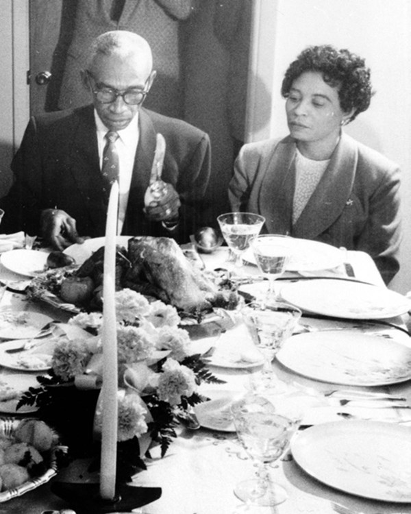 Daisy L. Gatson Bates & her husband, L.C., celebrate Thanksgiving with the Little Rock Nine in 1957.