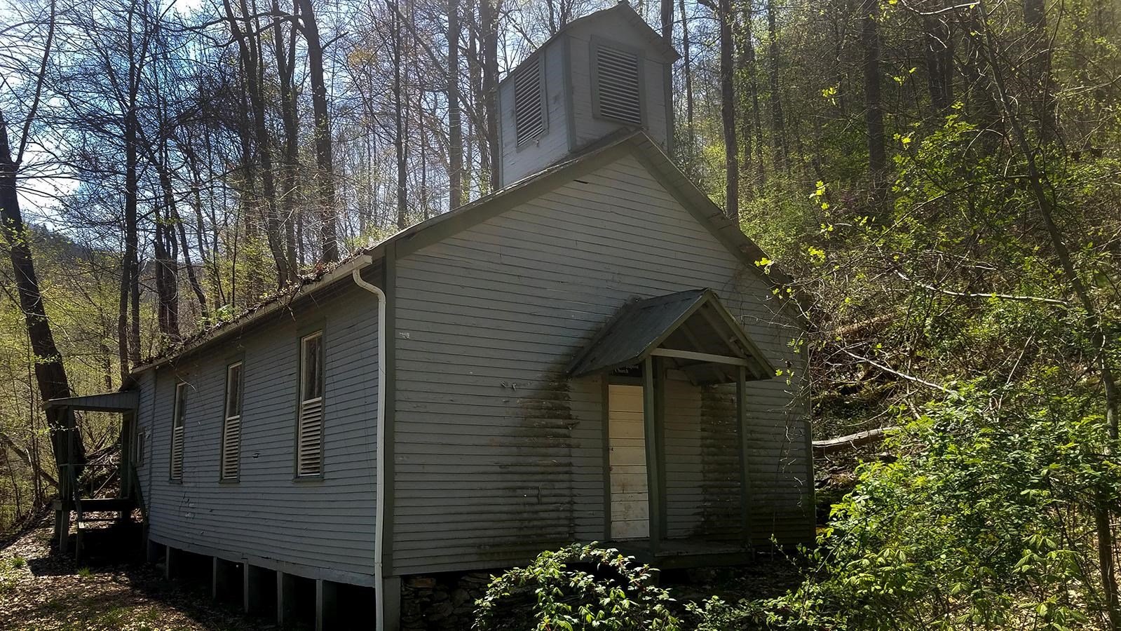 an old church in a forest