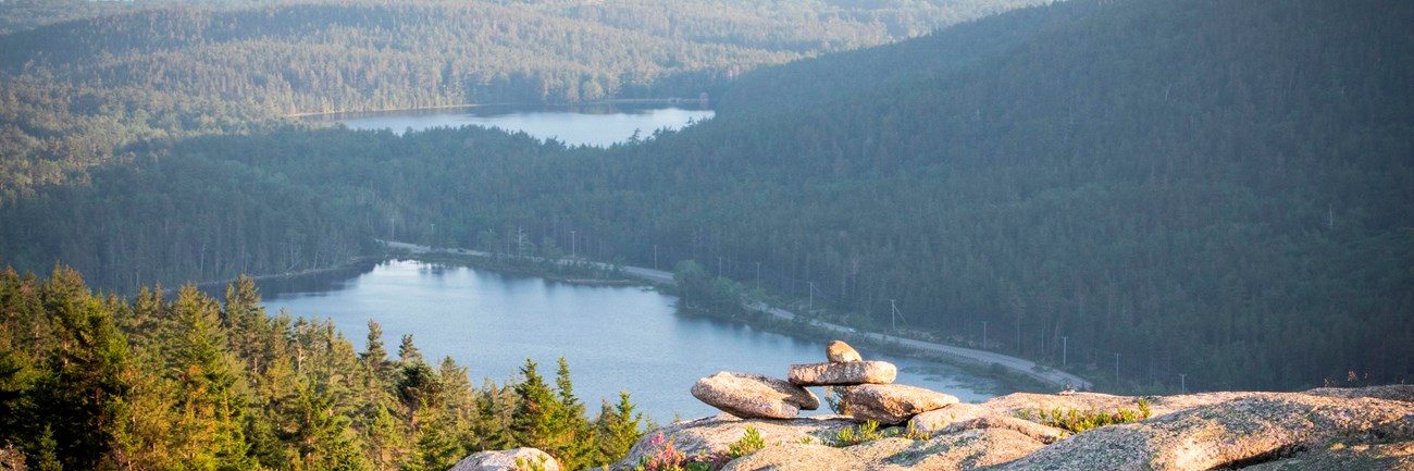 Rock cairn on an exposed granite mountain summit