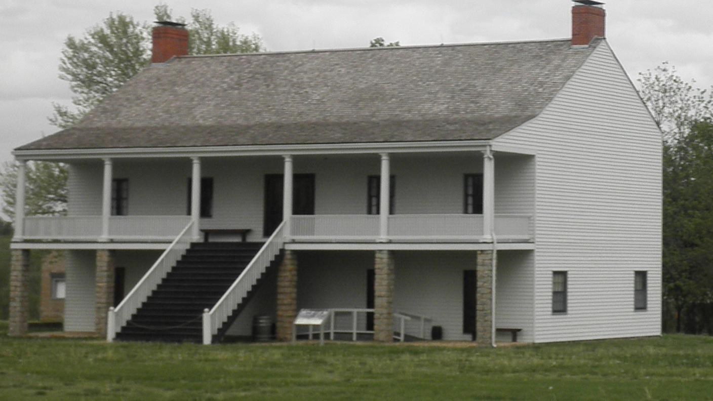 Two story builidng with stairway in middle