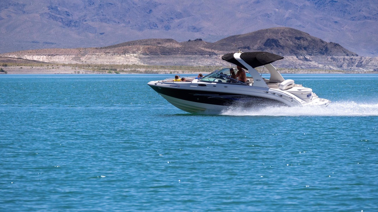 A powerboat on a large body of water