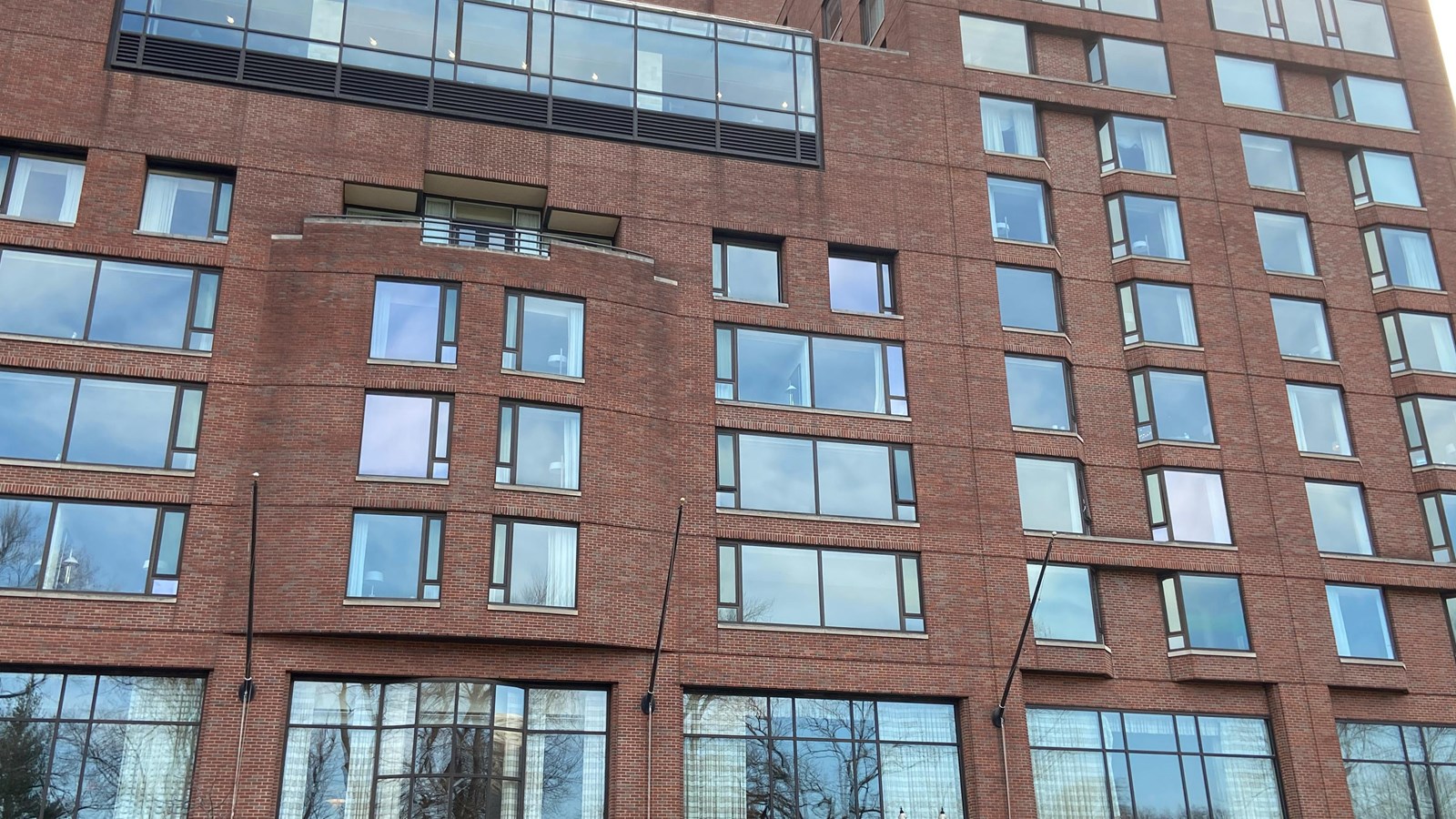 Large brick hotel building.