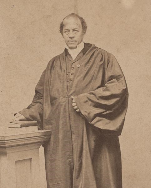 Standing portrait of Leonard Grimes, wearing ministerial robes