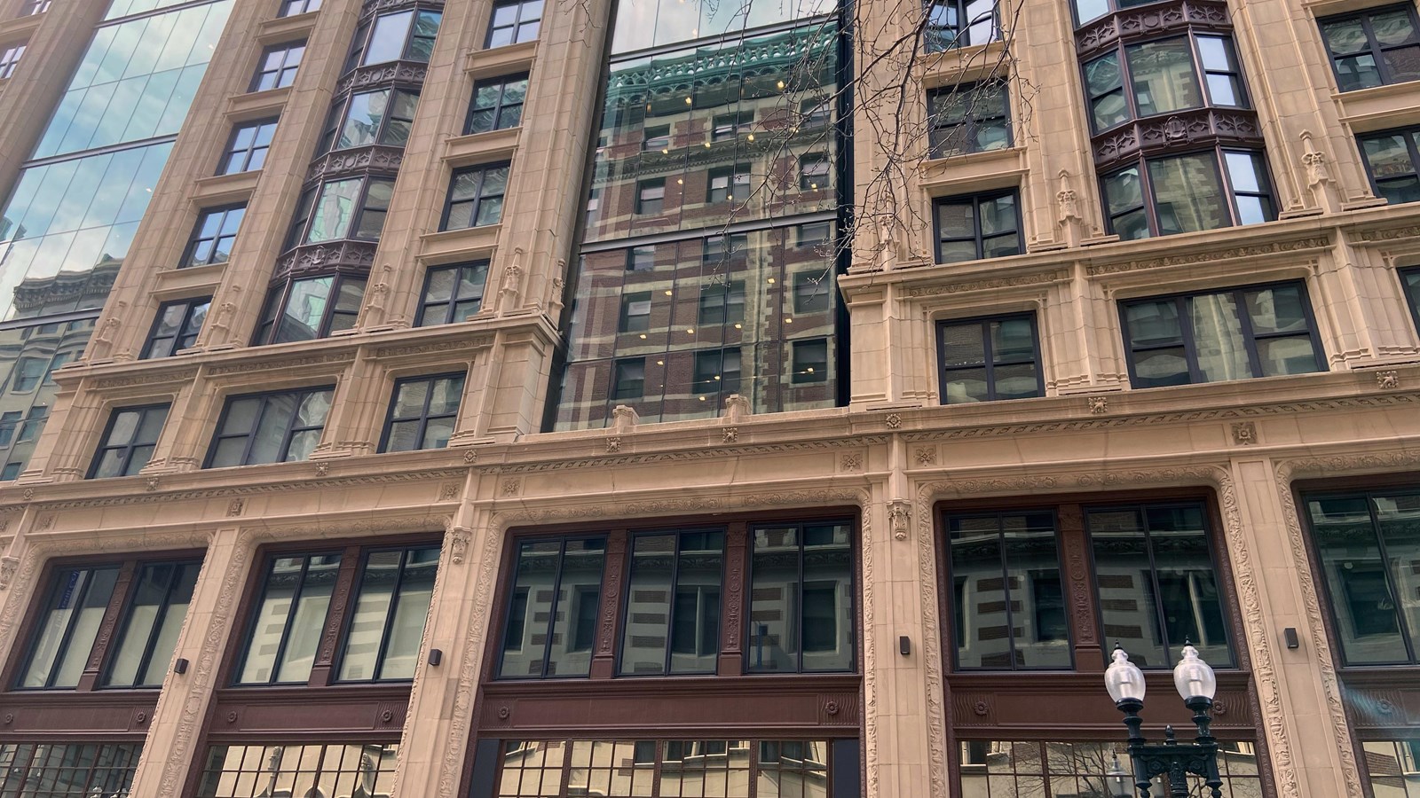 Side view of Little Building from Tremont Street. Large stone building with lots of windows.
