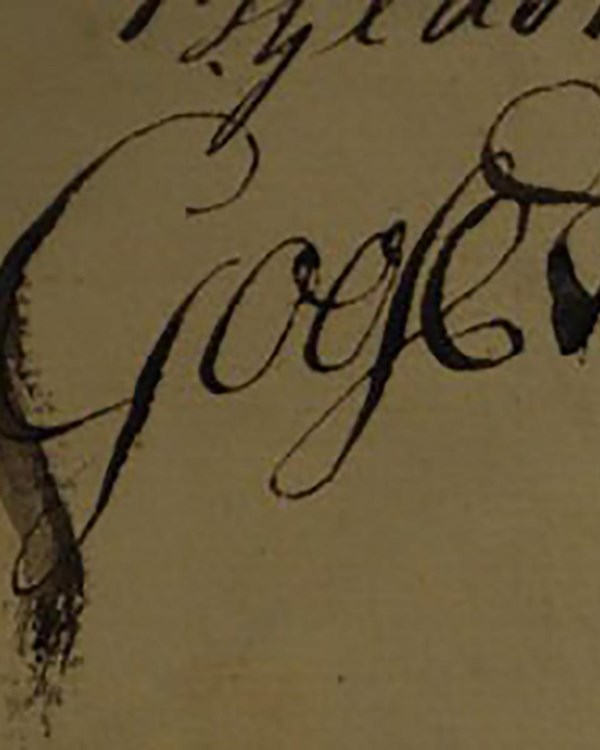 A signature on parchment paper.  