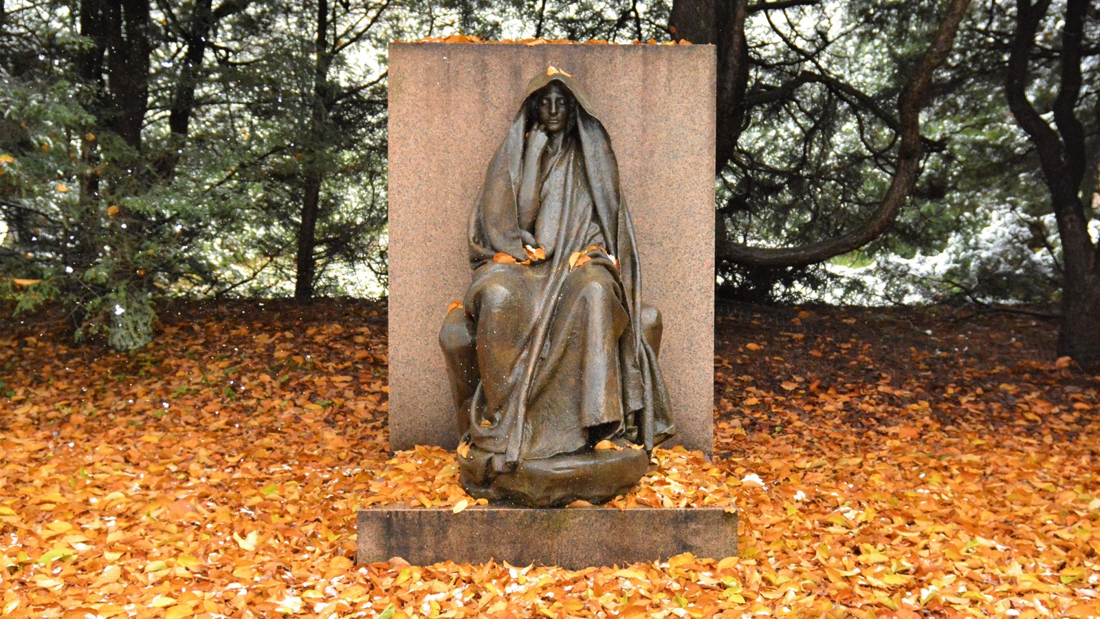 Adams Memorial with Golden Fall Leaves covering the ground