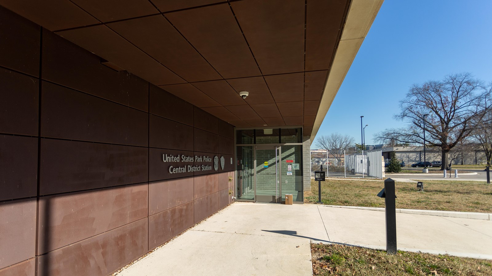 A brutal brown wall with text 