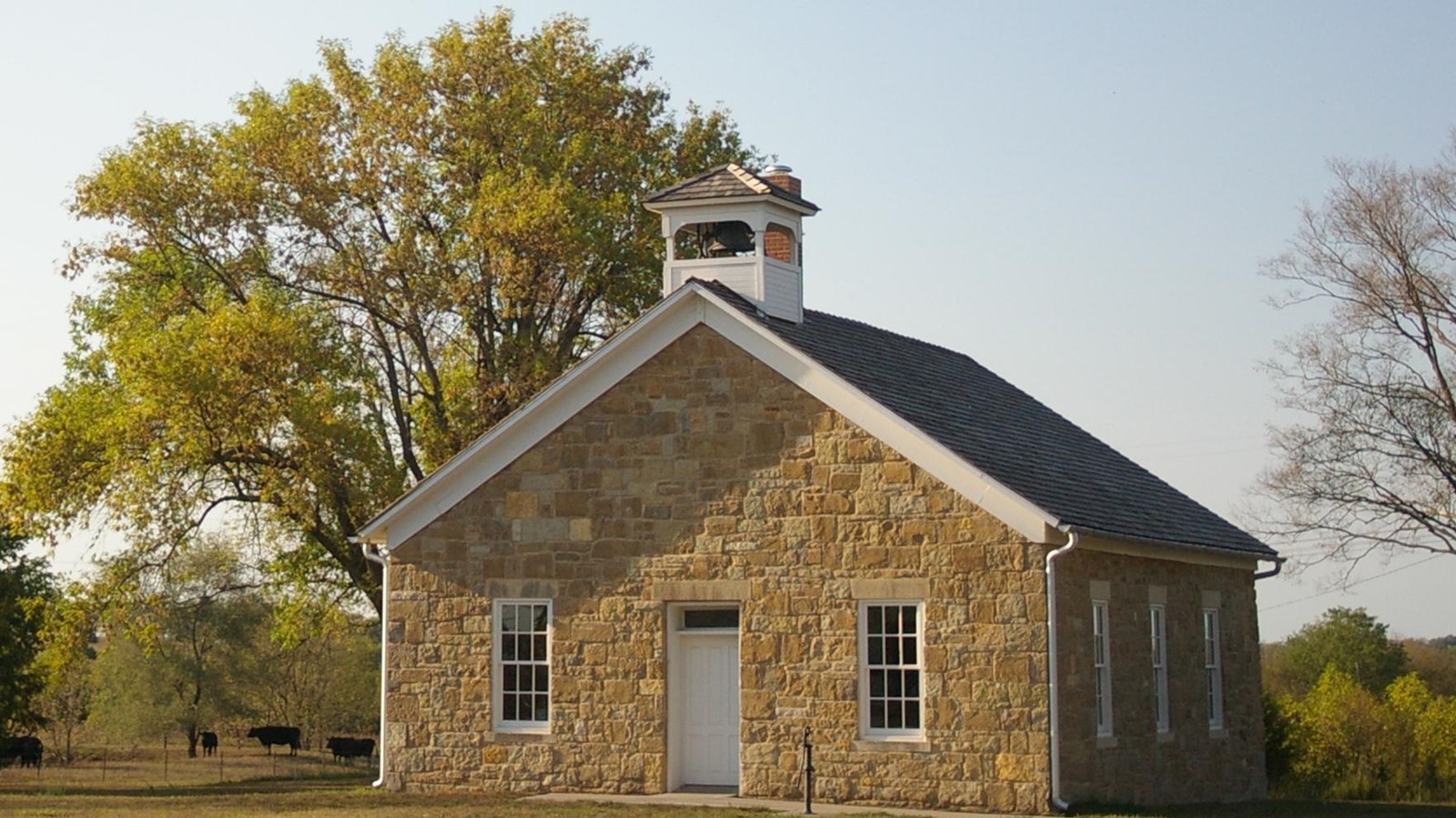 A stone one room school house.
