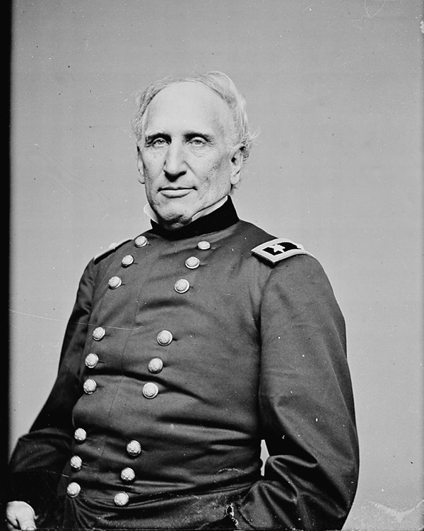 Black and white photograph of a man in a military uniform