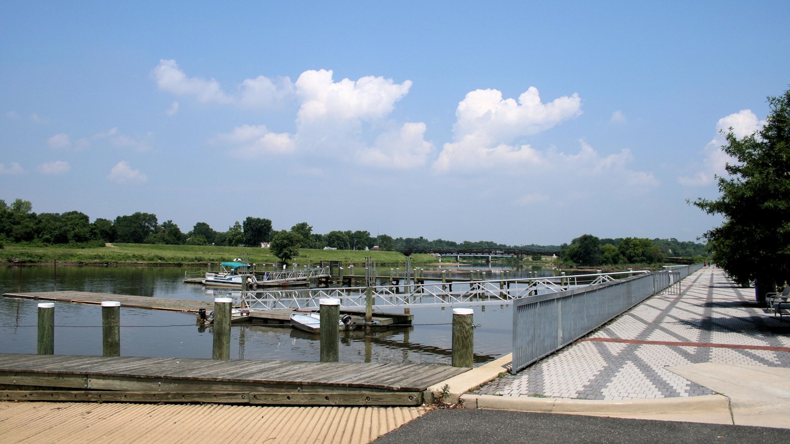 Waterfront park with a walkway and docks