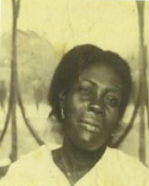 Sepia toned headshot of black woman with slight smile