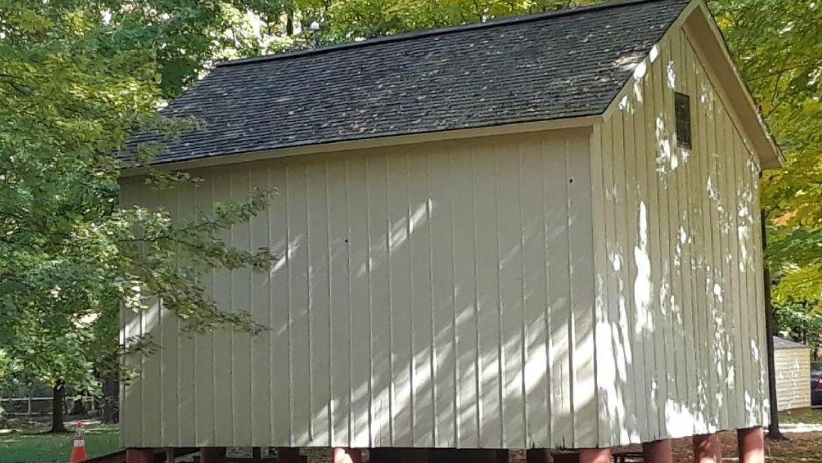 beige building on stilts