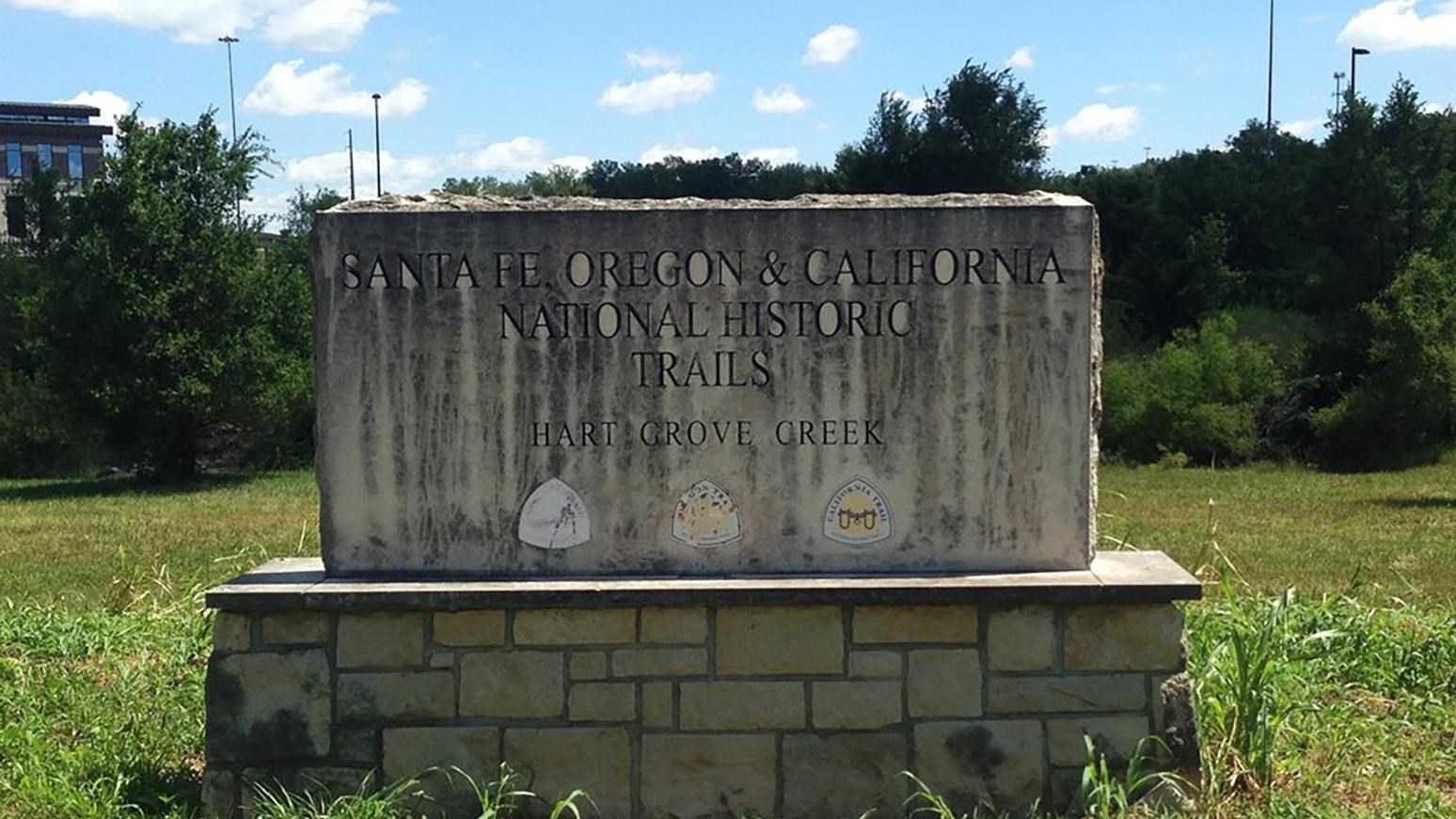 A large stone sign that reads 