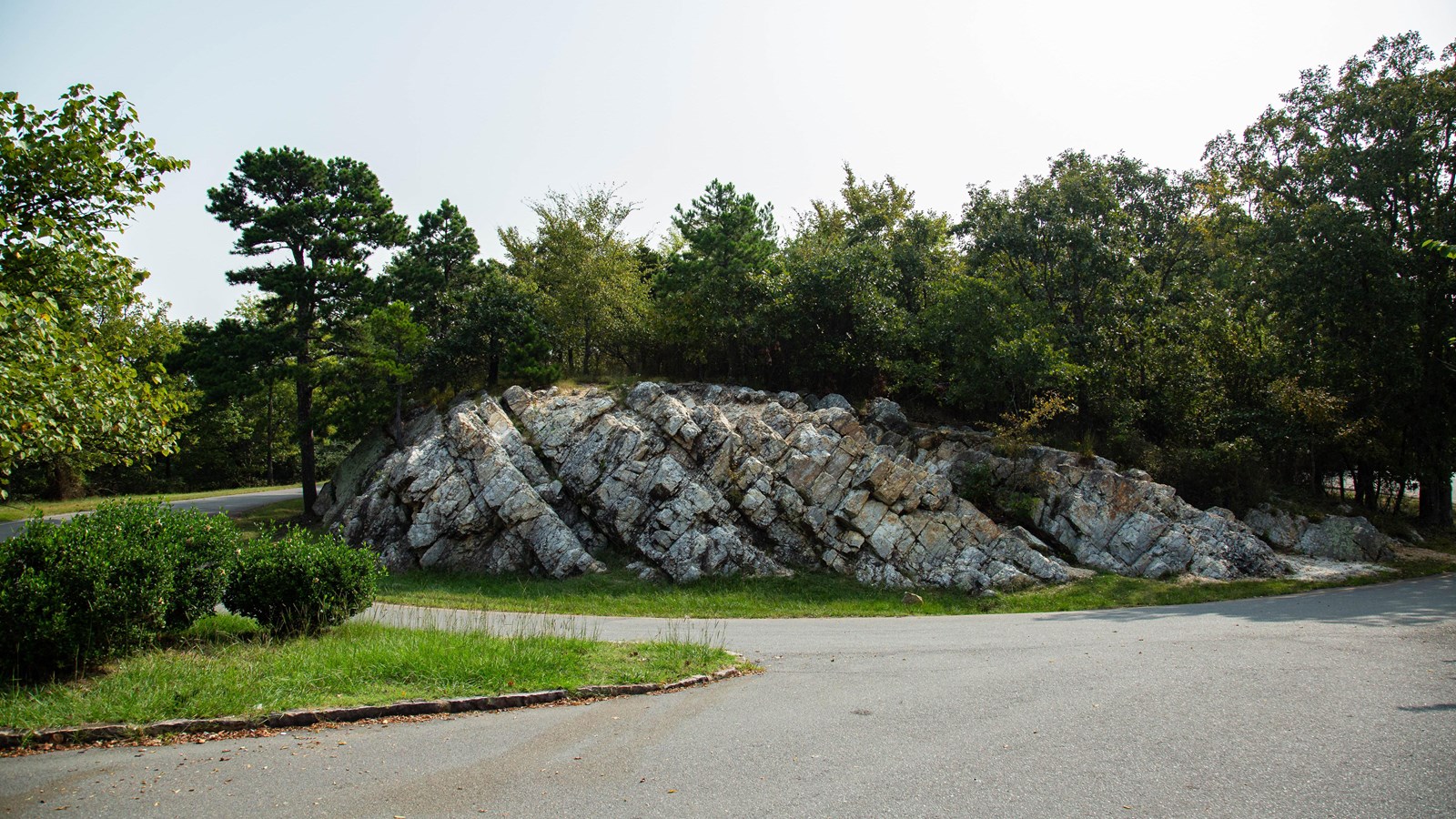 A large chunk of novaculite, about 30 feet wide along a mountain road
