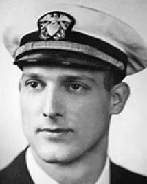 Man in suit and army hat poses for picture