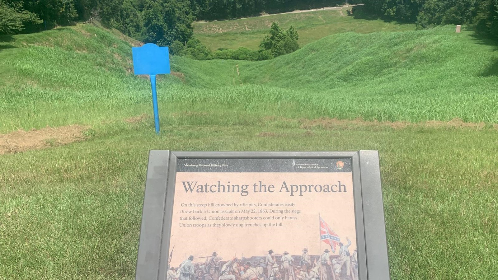 A view looking down the hill at Thayer\'s Approach from the Confederate lines.