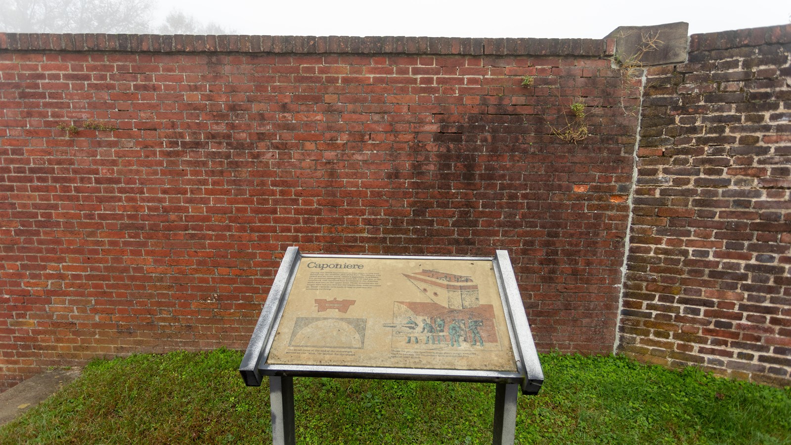 An information panel in front of a brick wall, featuring two diagrams, two illustrations, and text.