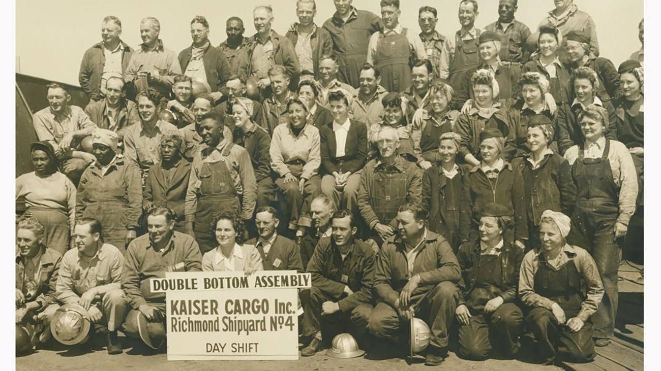 A large group of Richmond Shipyard Workers pose for a photo. Historic image.