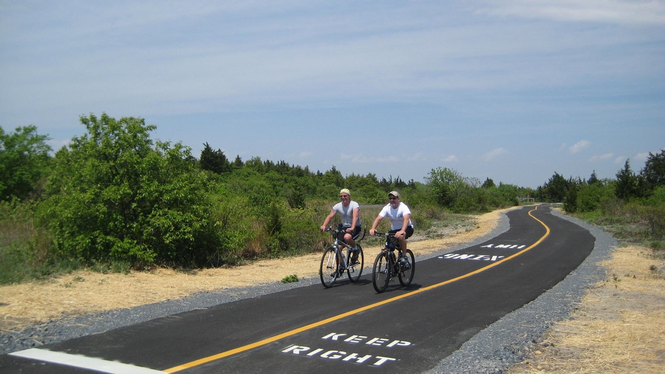 Two bicyclists on the Sandy Hook Multi Use Path